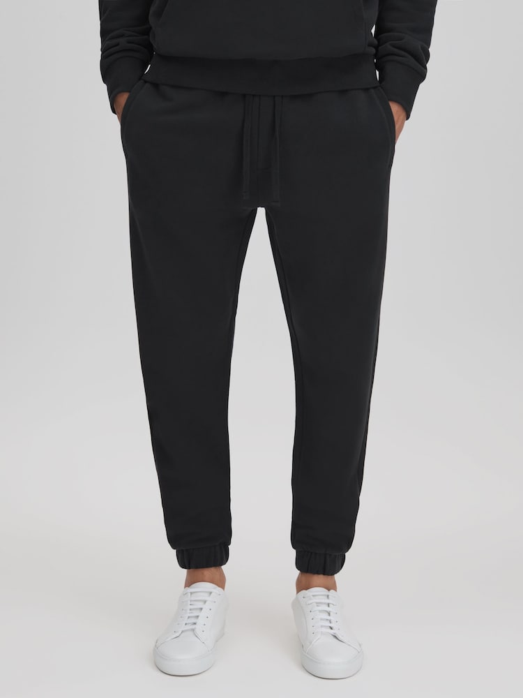 Reiss Washed Black Ali Fleece Lined Cotton Joggers - Image 1 of 6 Reiss Washed Black Ali Fleece Lined Cotton Joggers - Image 1 of 6