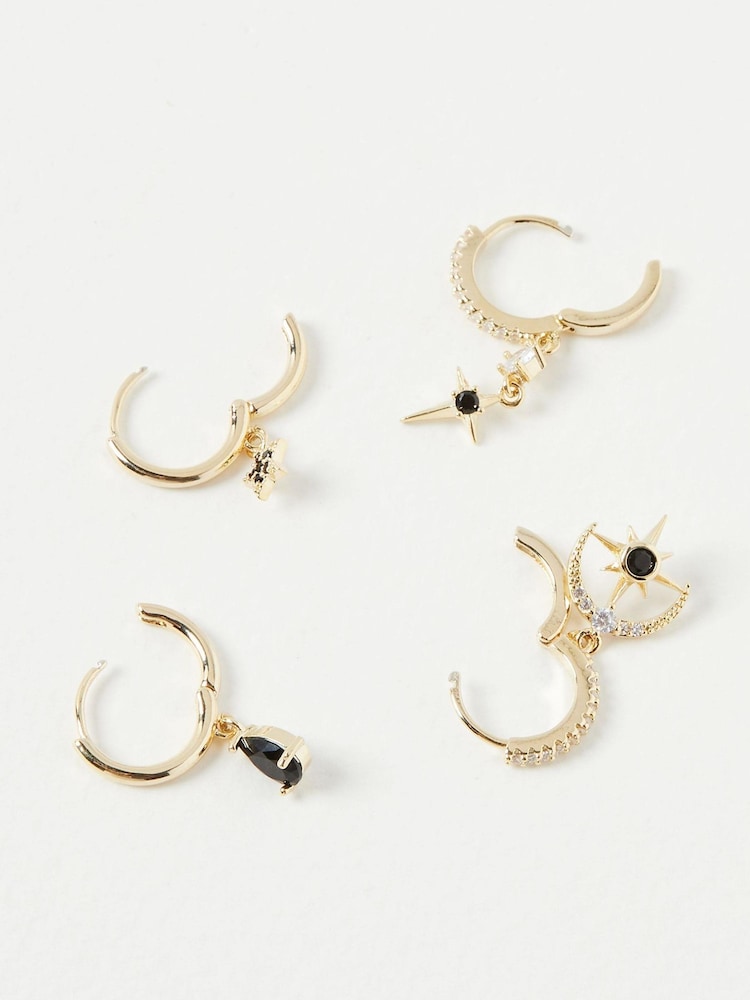 Oliver Bonas Black/Gold Tone Matira Celestial Huggie Earrings 4 Pack - Image 1 of 1