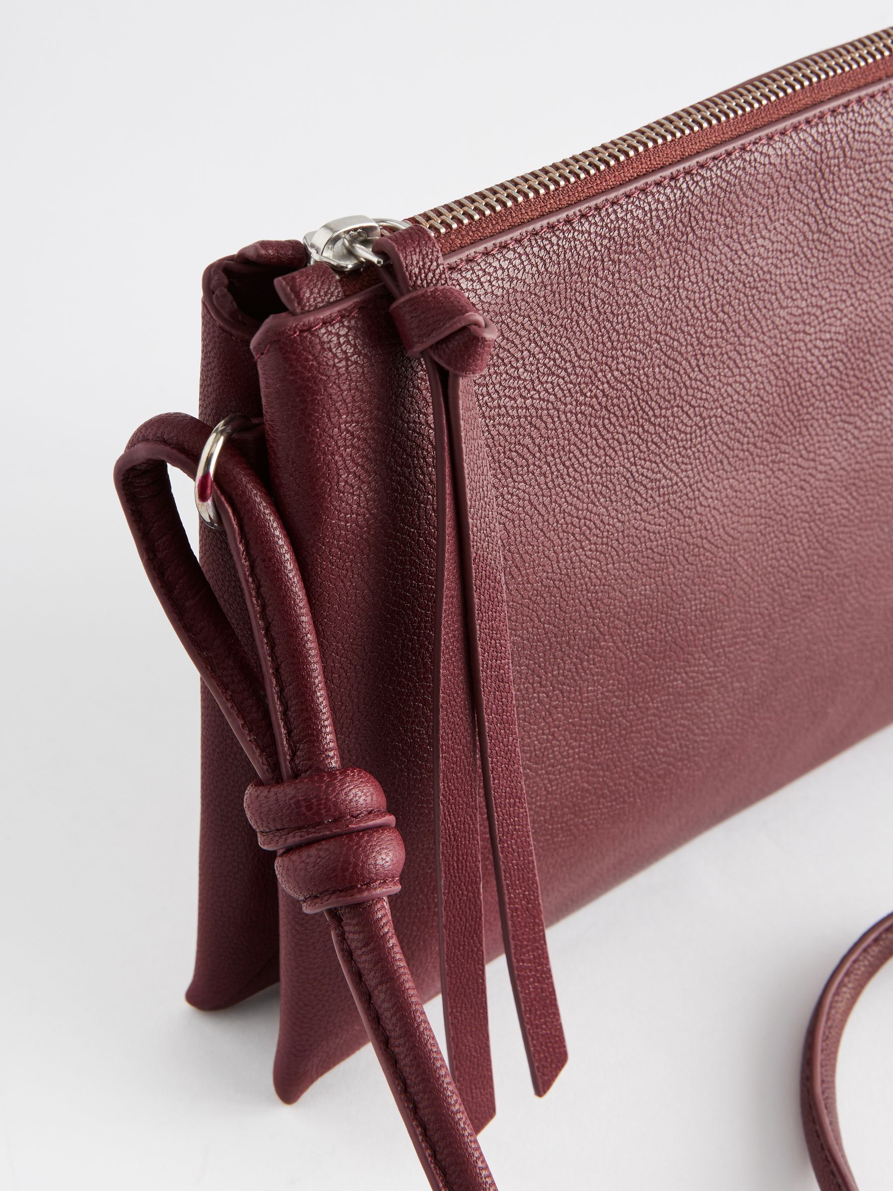 Burgundy leather cross body bag 2025