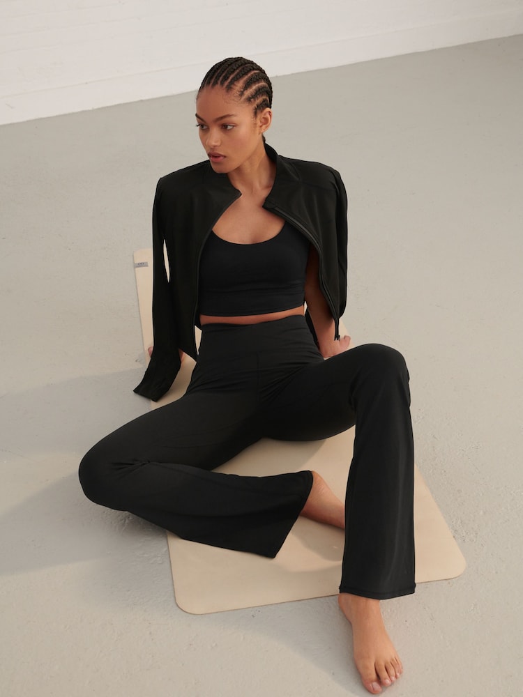 Negro - Leggings acampanados con cintura cruzada Active - Imagen 1 de 7