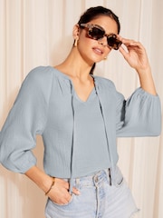 Friends Like These Blue 3/4  Sleeve Tie Neck Crinkle Cotton Blouson Blouse - Image 1 of 4