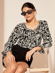 Friends Like These Black/White Textured Fauchette Jersey Long Sleeve Blouson Blouse - Image 1 of 4