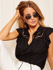Friends Like These Black Petite Ruffle Sleeve Tie Front Cutwork Embroidered Blouse - Image 2 of 4