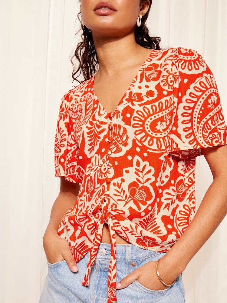 Friends Like These Red V Neck Tie Front Short Crinkle Woven Sleeve Top - Image 1 of 4 Friends Like These Red V Neck Tie Front Short Crinkle Woven Sleeve Top - Image 1 of 4