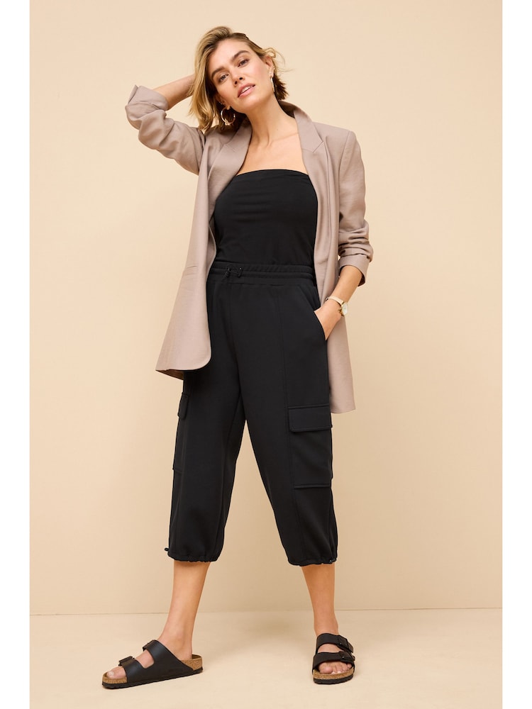 Black Slinky Capri 3/4 Length Crop Cargo Trousers - Image 2 of 7 Black Slinky Capri 3/4 Length Crop Cargo Trousers - Image 2 of 7