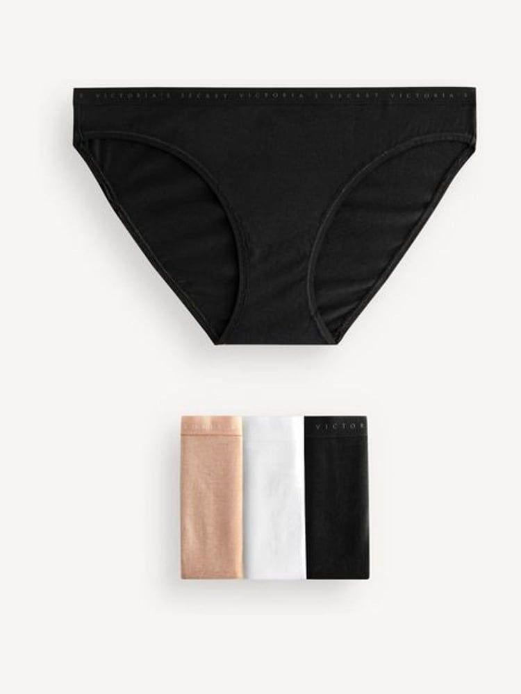 Victoria's Secret Black/White/Nude Bikini Logo 4 Pack Knickers - Image 1 of 3 Victoria's Secret Black/White/Nude Bikini Logo 4 Pack Knickers - Image 1 of 3