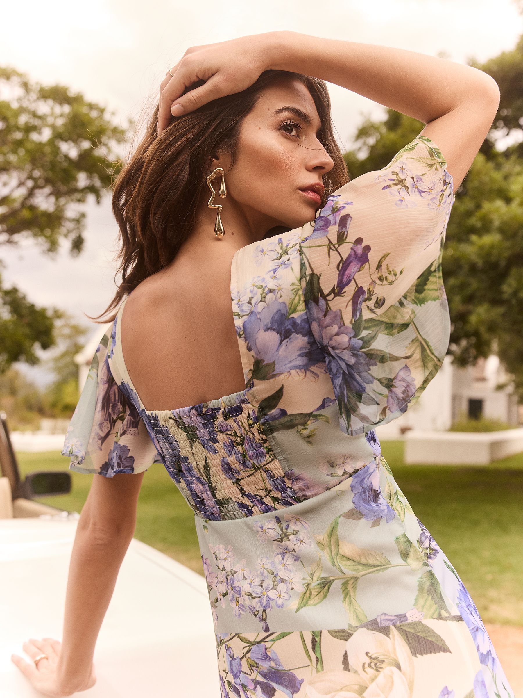 Buy Lipsy Blue Flutter Sleeve Floral Chiffon Midi Dress from Next Australia