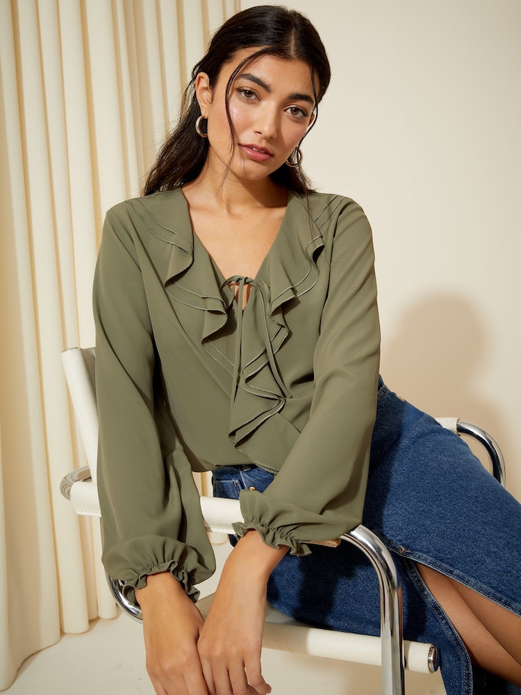 Friends Like These Khaki Green Long Sleeve Tie Front Double Ruffle Blouse - Image 1 of 4 Friends Like These Khaki Green Long Sleeve Tie Front Double Ruffle Blouse - Image 1 of 4