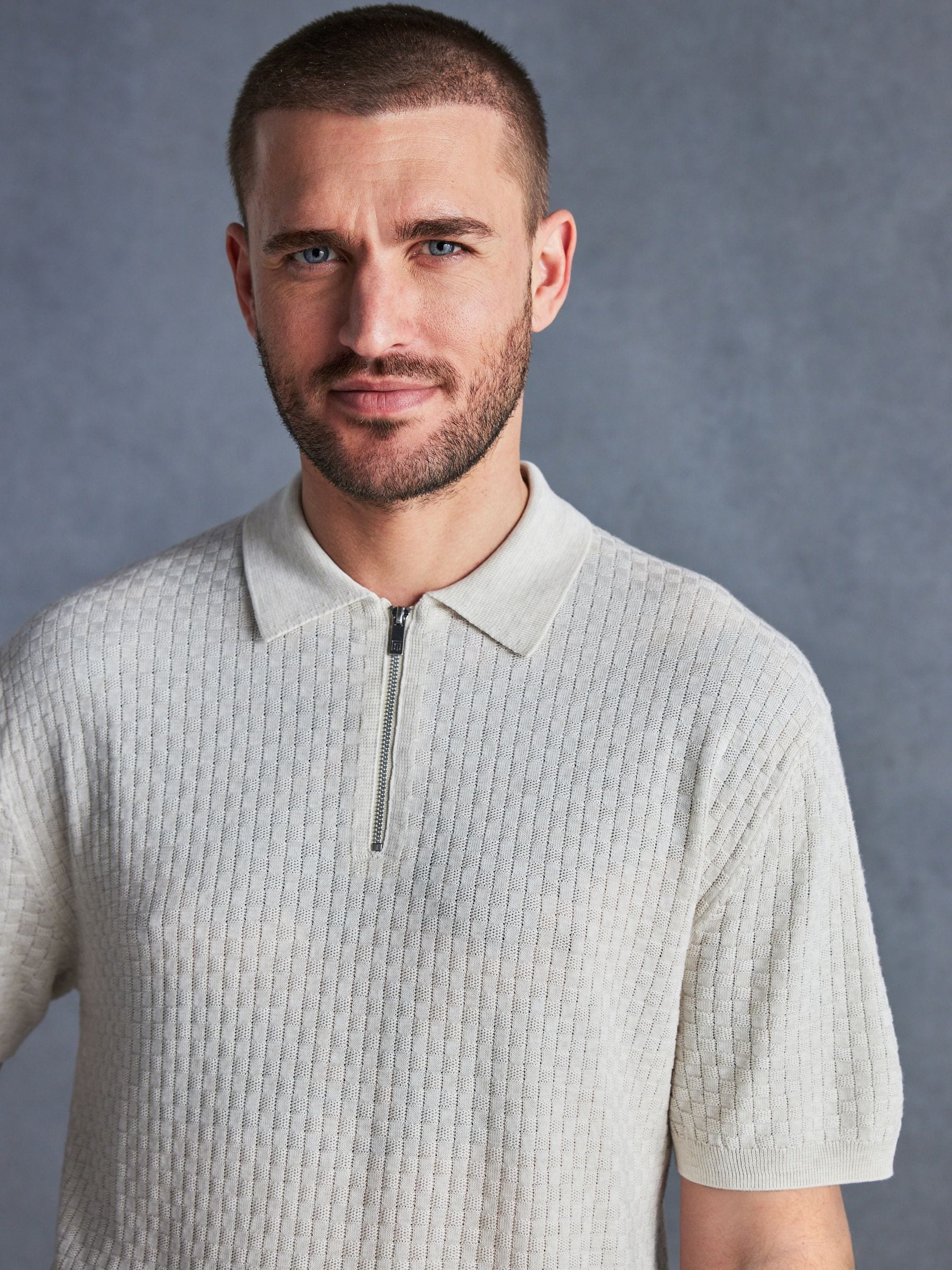 Buy Ecru White Signature Regular Textured Polo Shirt from Next Luxembourg