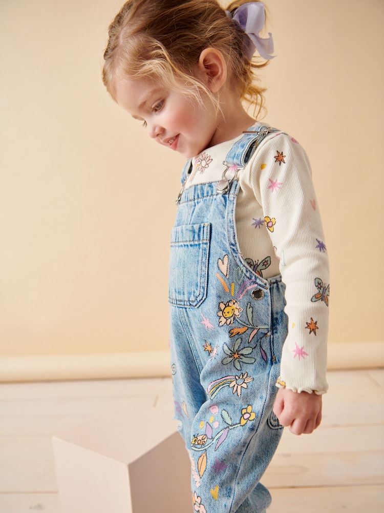 Denim - Latzhose mit Blumenmuster aus 100 % Baumwolle (3 Monate – 7 Jahre) - Bild 2 von 8 Denim - Latzhose mit Blumenmuster aus 100 % Baumwolle (3 Monate – 7 Jahre) - Bild 2 von 8