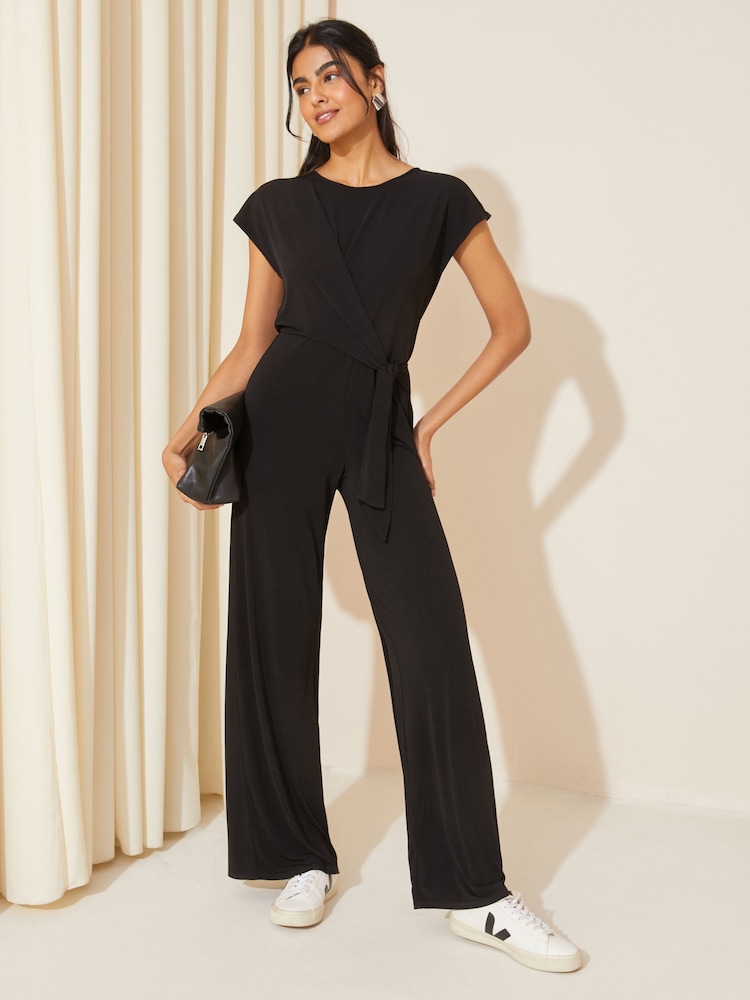 Friends Like These Black Short Sleeve Tie Waist Jumpsuit - Image 1 of 4
