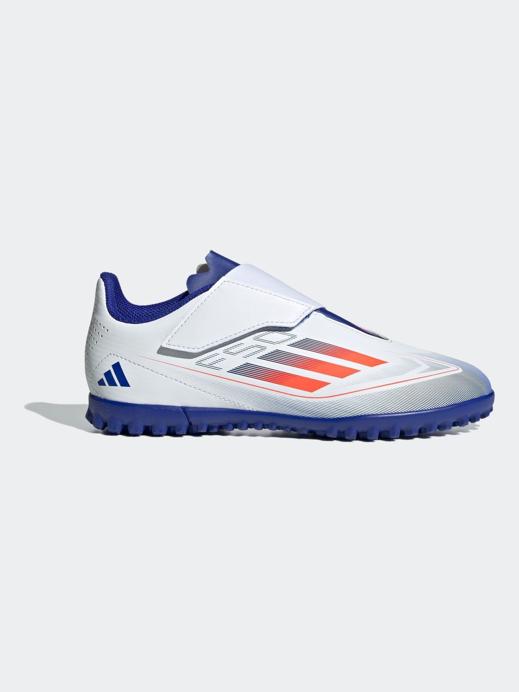 Buy adidas White Blue Red Kids F50 Club Hook and Loop Turf Football Boots from Next Qatar