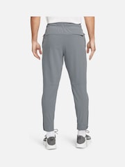 Серый - Nike Unlimited Спортивные брюки на молнии Dri-FIT - Изображение 2 из 12
