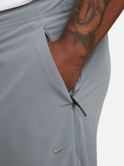 Серый - Nike Unlimited Спортивные брюки на молнии Dri-FIT - Изображение 9 из 12