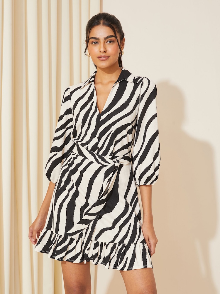 Friends Like These Black/White Animal V Neck Belted Mini Shirt Dress - Image 1 of 4 Friends Like These Black/White Animal V Neck Belted Mini Shirt Dress - Image 1 of 4