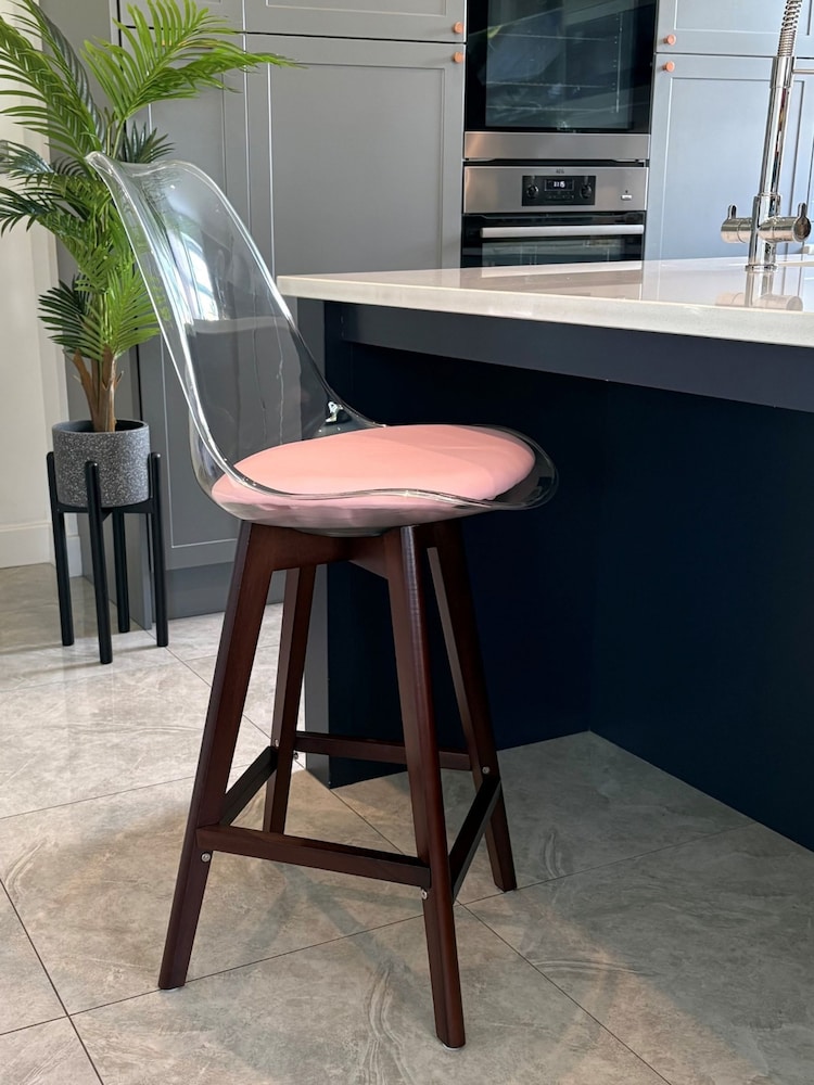 Fusion Living Blush Pink Soho Clear Plastic Bar Stool with Dark Wood Legs - Image 1 of 5