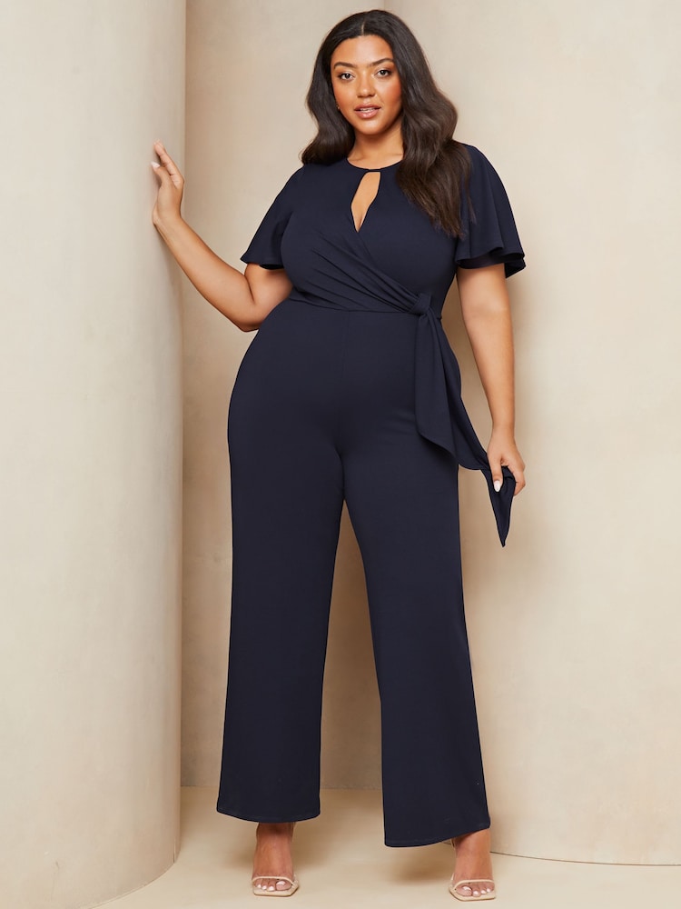 Lipsy Navy Blue Curve Flutter Sleeve Tie Side Wide Leg Jumpsuit - Image 1 of 4