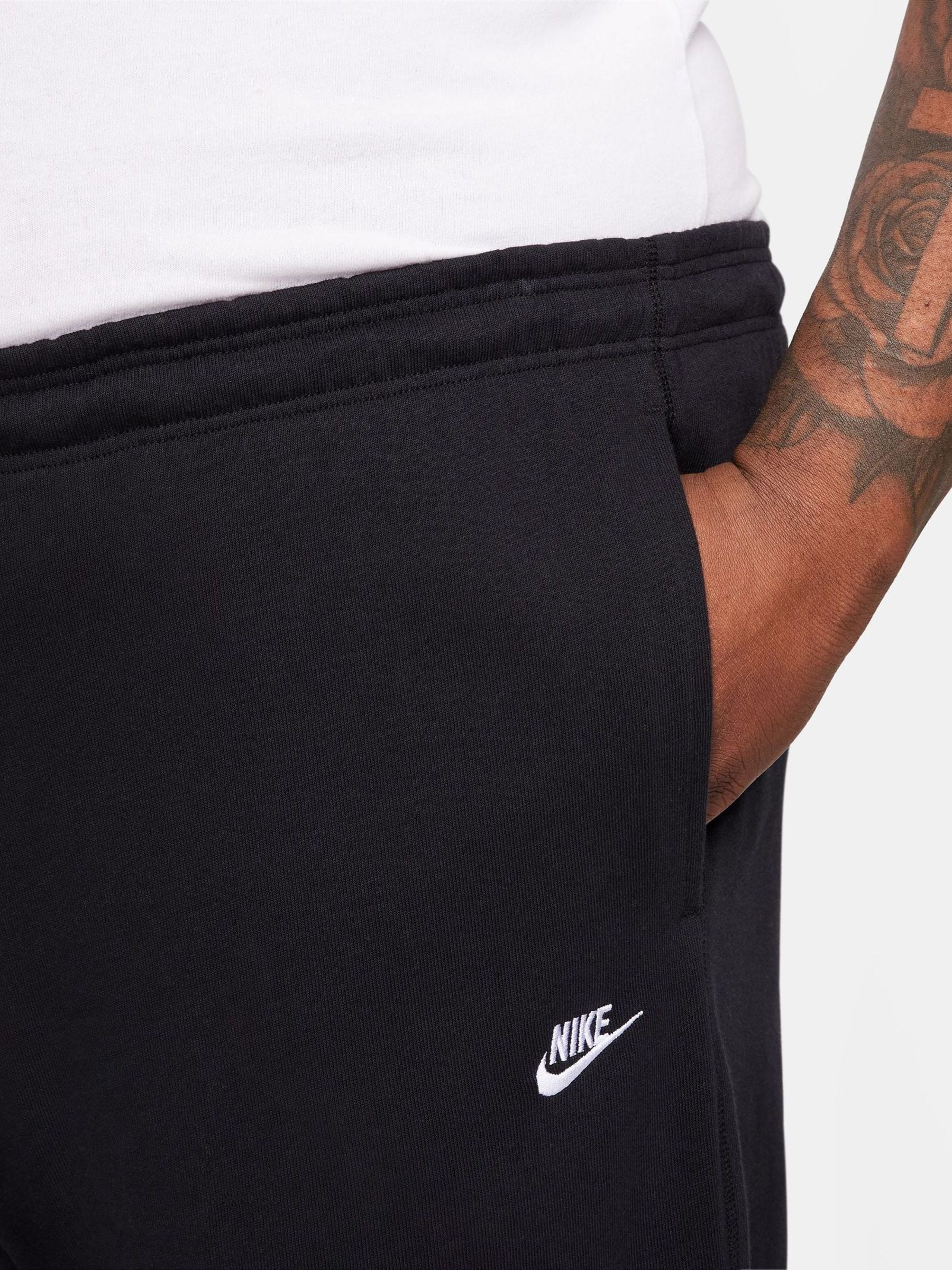 nike club essentials open hem sweatpants in black