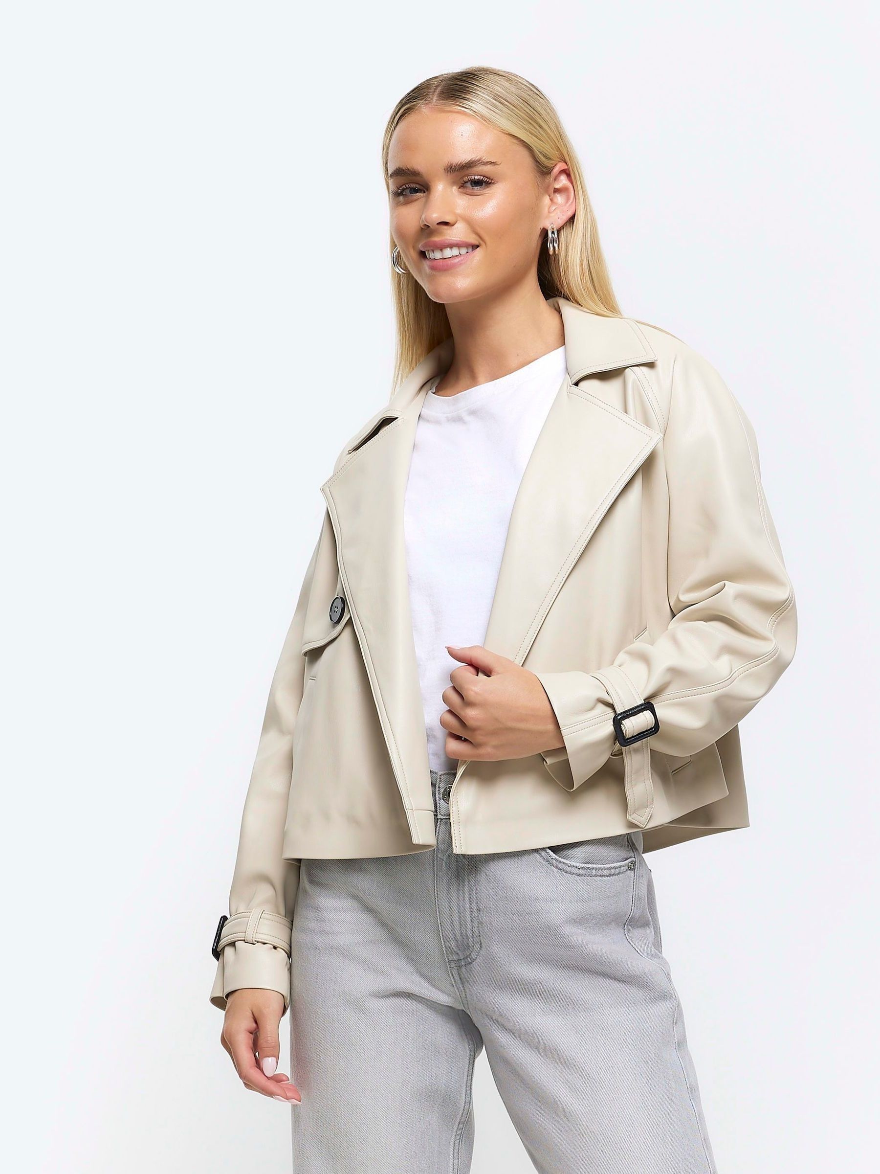 Buy River Island Cream Petite Faux Leather Crop Trench Coat from Next Luxembourg