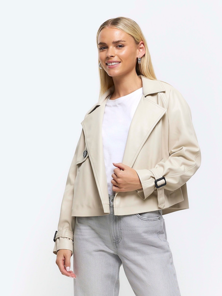 Buy River Island Cream Petite Faux Leather Crop Trench Coat from