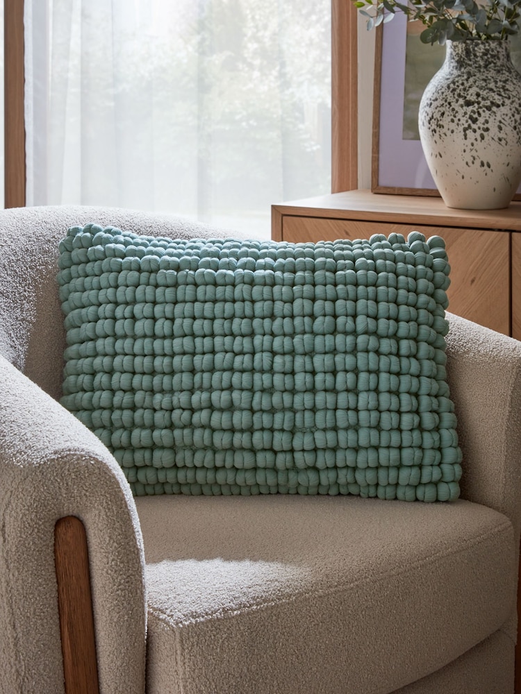 Light Blue 40 x 59cm Global Bobble 100% Cotton Cushion - Image 1 of 4