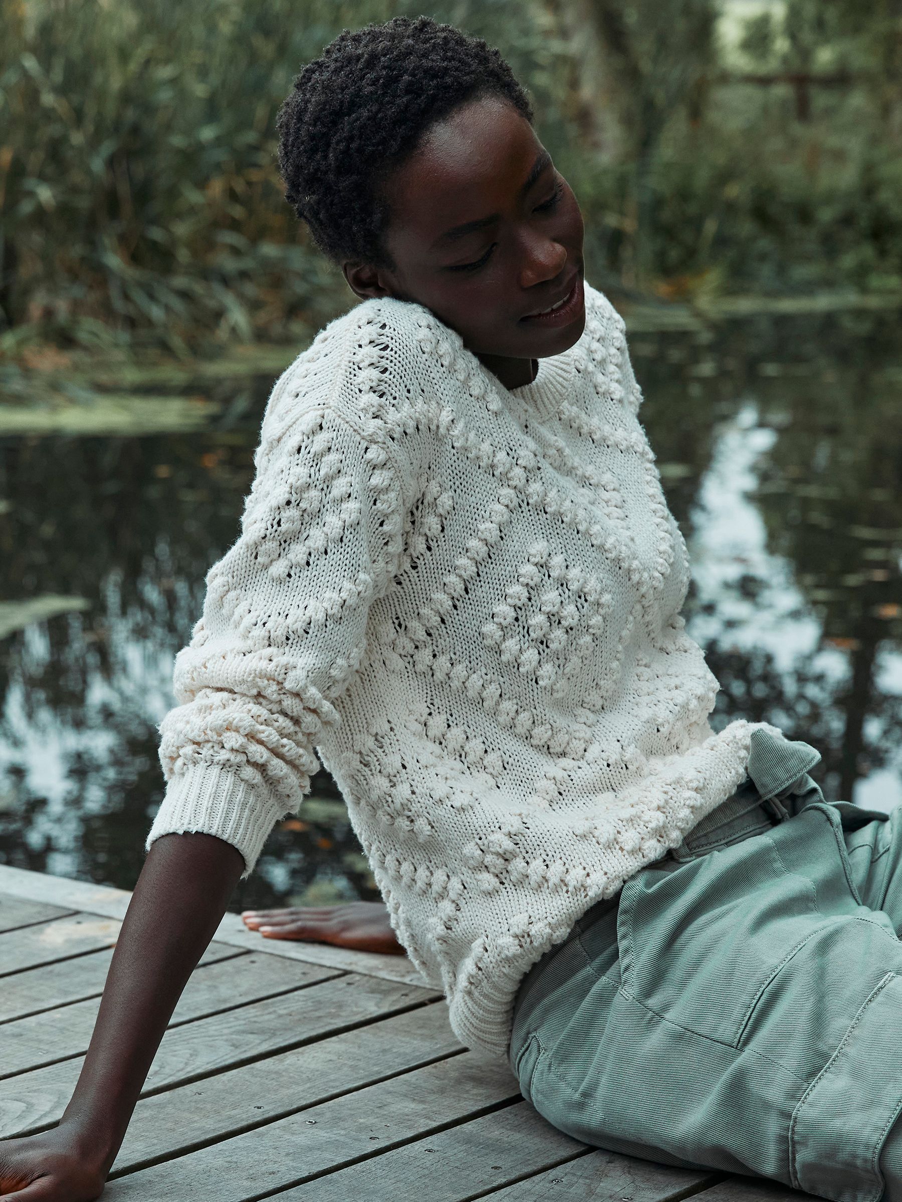 White bobble jumper top