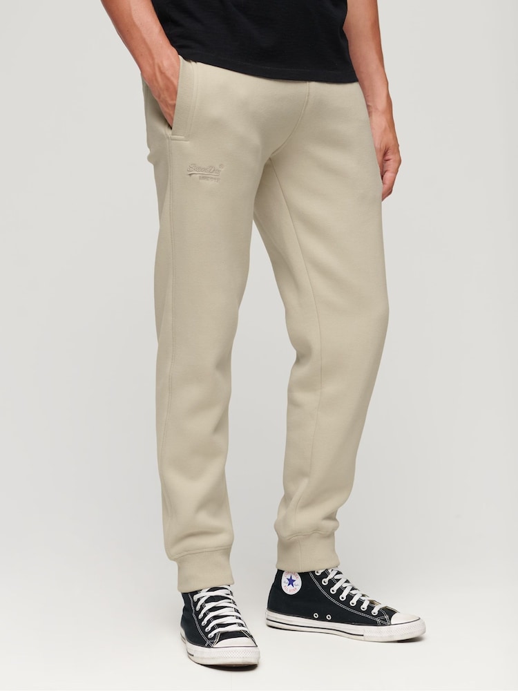 Off White - спортивные брюки с логотипом Superdry Essential - Изображение 1 из 6 Off White - спортивные брюки с логотипом Superdry Essential - Изображение 1 из 6