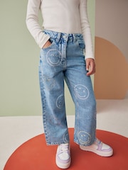 Mid Blue Denim SmileyWorld® Wide Leg 100% Cotton Jeans (3-16yrs) - Image 1 of 8