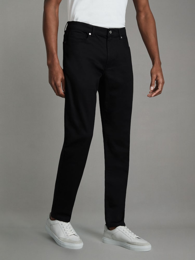Vaqueros tapered de punto de corte entallado en negro Rufus de Reiss - Imagen 1 de 6
