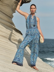 Love & Roses Blue Paisley Printed Halter Wide Leg Jumpsuit - Image 1 of 4