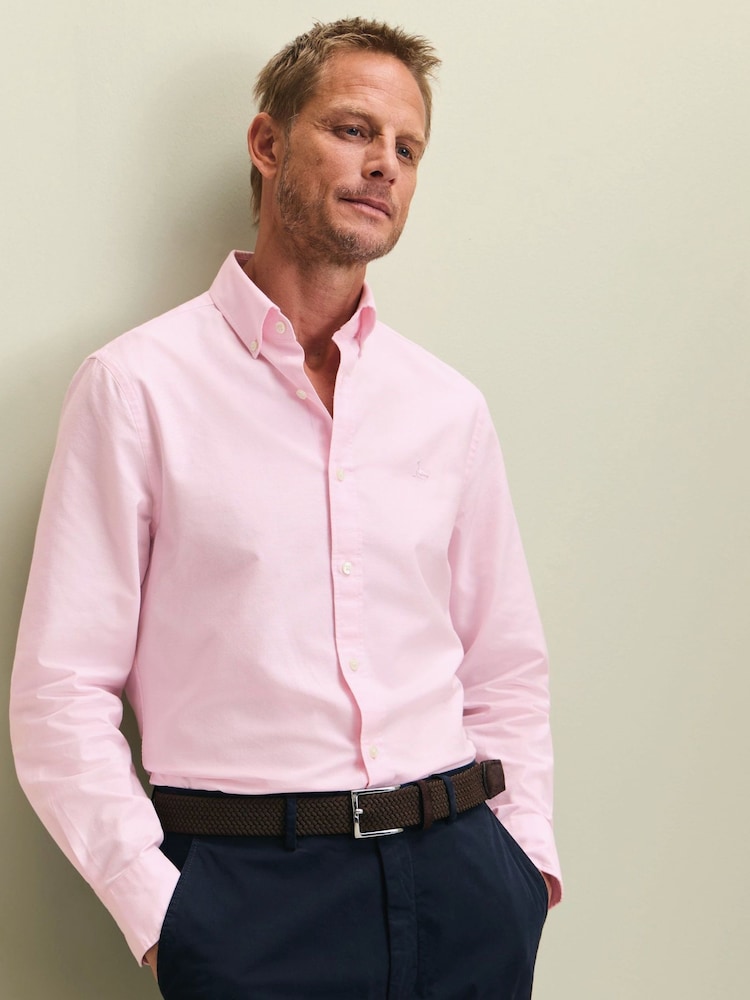 Rosa - Ajuste fino - Camisa Oxford lisa com botões e tecido stretch lavado Charles Tyrwhitt - Imagem 1 de 6