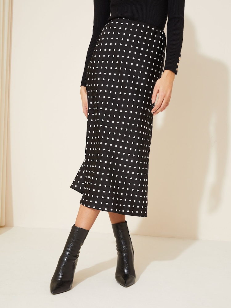 Curves Like These Black Polka Dot Satin Bias Midi Skirt - Image 1 of 4