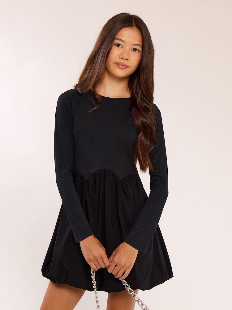 Lipsy Black Long Sleeve 2-in-1 Puffball Dress (5-16yrs) - Image 1 of 5 Lipsy Black Long Sleeve 2-in-1 Puffball Dress (5-16yrs) - Image 1 of 5