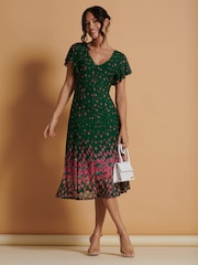 Grün - Jolie Moi Ausgestelltes Midikleid aus Mesh mit gespiegeltem Druck - Bild 5 von 6