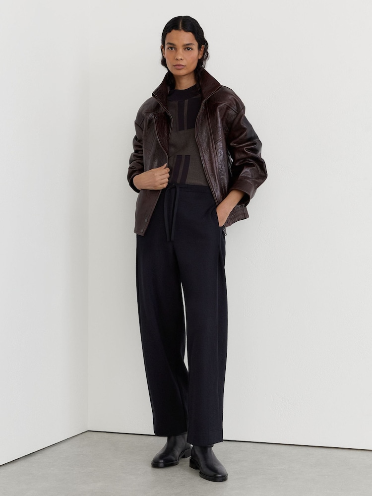 Reiss Black Leoni Petite Cotton-Blend Barrel-Leg Drawstring Trousers - Image 1 of 7 Reiss Black Leoni Petite Cotton-Blend Barrel-Leg Drawstring Trousers - Image 1 of 7