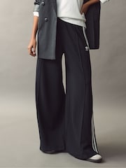 Черный - Широкие брюки из 100% хлопка с 3 полосками adidas Originals - Изображение 1 из 6