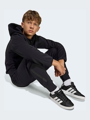 تشكيلة Z.N.E من adidas بنطلون رياضي أضيق من أسفل للأطفال - صورة 3 من 8
