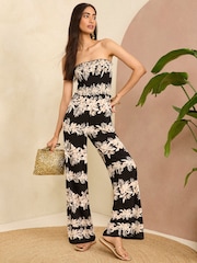 Love & Roses Black and White Floral Shirred Bandeau Wide Leg Jersey Jumpsuit - Image 1 of 4
