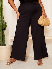 Curves Like These Black Linen Look Wide Leg Trousers - Image 1 of 4