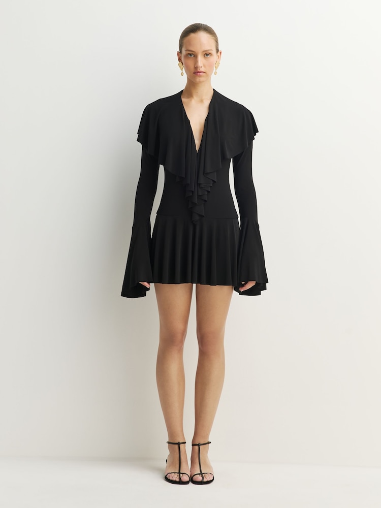 Norma Kamali Black Deep V-Neck Ruffle Mini Dress - Image 1 of 12 Norma Kamali Black Deep V-Neck Ruffle Mini Dress - Image 1 of 12