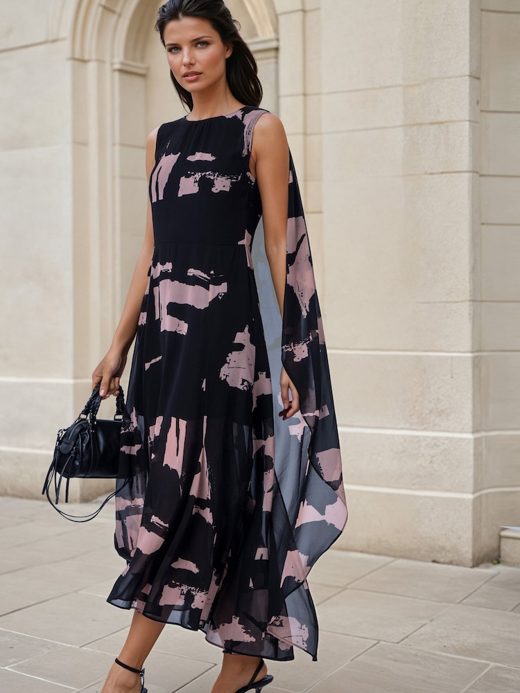 Religion Black Shea Maxi Occason Dress With Cape Styling In Abstract Facade Print - Image 1 of 8 Religion Black Shea Maxi Occason Dress With Cape Styling In Abstract Facade Print - Image 1 of 8