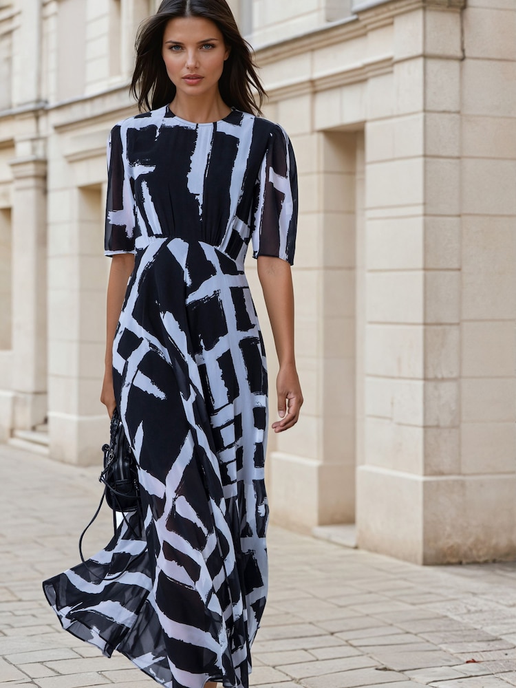 Religion Black Sienna Tea Dress In Abstract Monochrome Selvage With Full Skirt - Image 1 of 8 Religion Black Sienna Tea Dress In Abstract Monochrome Selvage With Full Skirt - Image 1 of 8