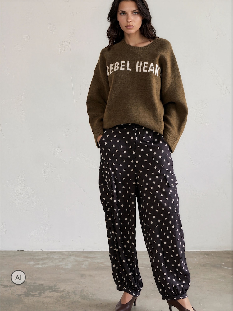 Crno Polka Dot - Religion Ash Cuffed Balloon Cvetne Pantalone - Slika 6 od 6 Crno Polka Dot - Religion Ash Cuffed Balloon Cvetne Pantalone - Slika 6 od 6