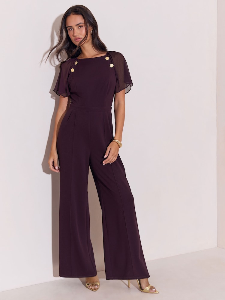Lipsy Burgundy Red Chiffon Flutter Sleeve Miltary Button Jumpsuit - Image 1 of 5 Lipsy Burgundy Red Chiffon Flutter Sleeve Miltary Button Jumpsuit - Image 1 of 5