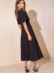 Friends Like These Navy Flutter Sleeve Ruched Hardware Midi Dress - Image 5 of 5