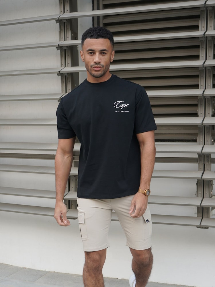 Itim - CAPO International T-Shirt - Larawan 12 ng 12