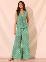 بنطلون برِجل واسعة بطبعة صدف من Mint Velvet - صورة 1 من 8