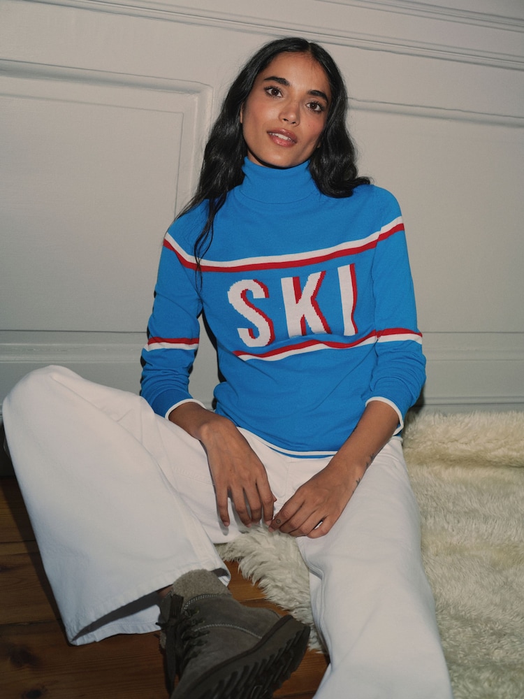 Blue Ski Slogan Long Sleeve Roll Neck Jumper - Image 1 of 7 Blue Ski Slogan Long Sleeve Roll Neck Jumper - Image 1 of 7