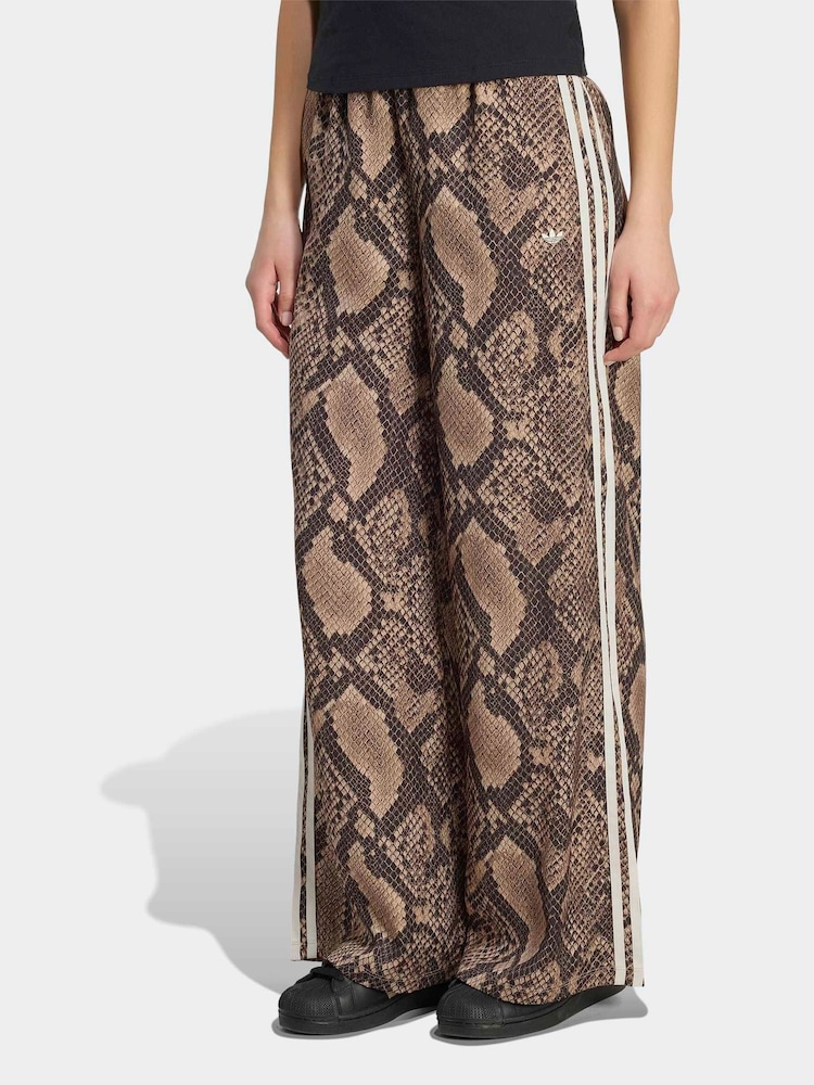 adidas Originals Cream Satin Snake Print Wide Leg Track Joggers - Image 1 of 6 adidas Originals Cream Satin Snake Print Wide Leg Track Joggers - Image 1 of 6