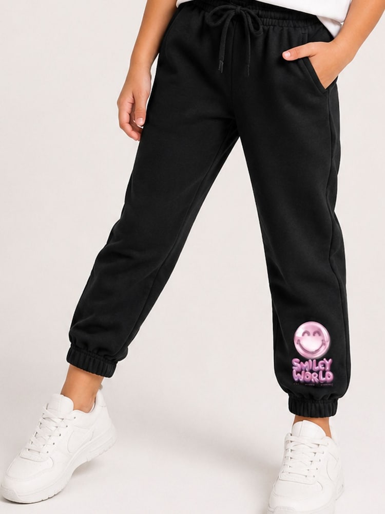 Brand Threads Black Joggers with Iconic Face Print - Image 1 of 4 Brand Threads Black Joggers with Iconic Face Print - Image 1 of 4